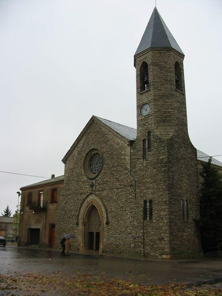 12.8.2012 '.. La modernitat del poble explica aquesta església singular amb un campanar de pissarra, únic a la Segarra.'  Sant Guim de Freixenet -  Josep Maria Santesmasses Palou