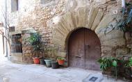 Sant Pere dels Arquells: Pou i porta adovellada  Ramon Sunyer